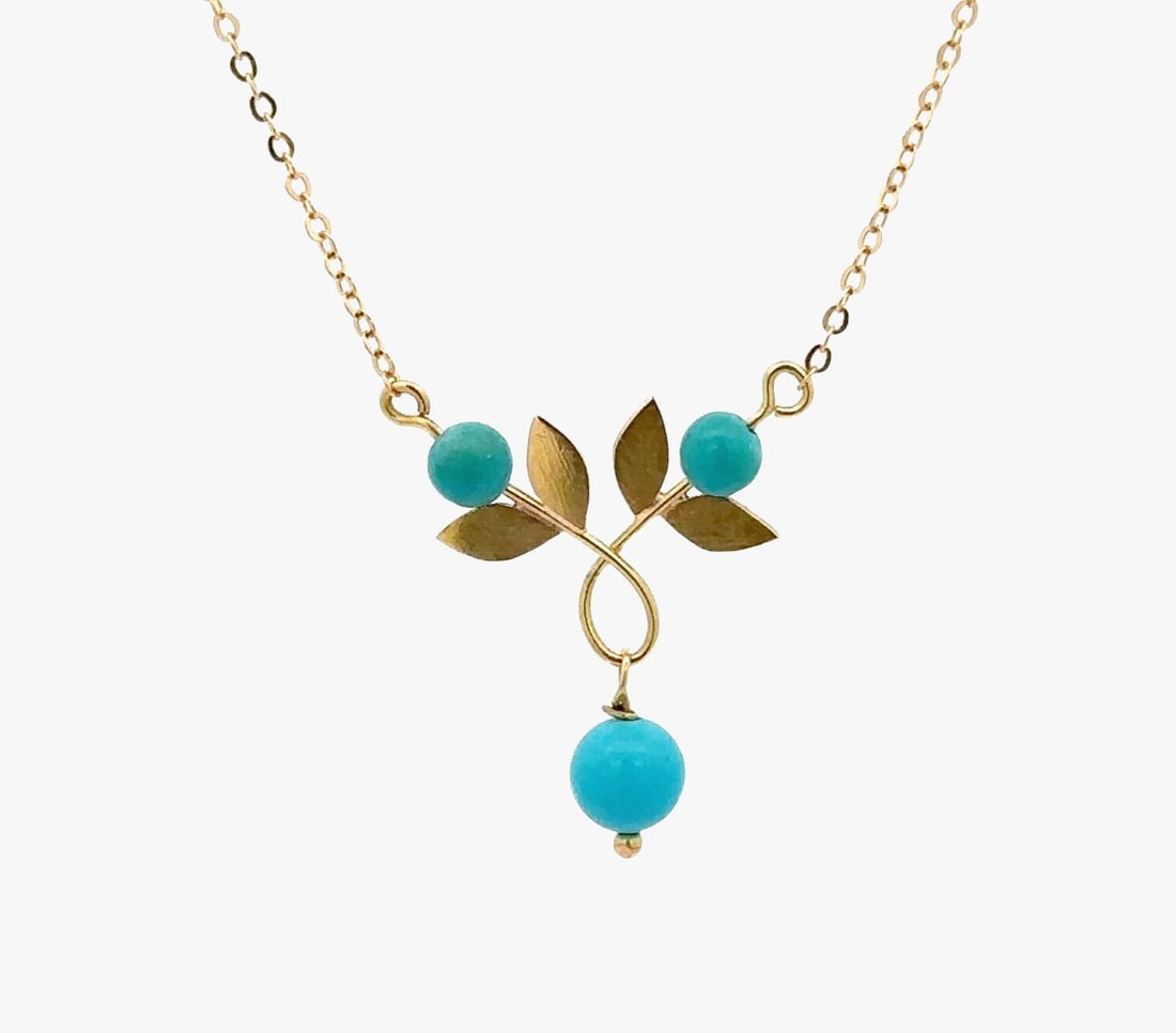 Balestra 18k Yellow Gold Leaf Pendant with Turquoise Beads Necklace: Balestra 18k Yellow Gold Leaf Pendant with Turquoise Beads Necklace This stunning Balestra necklace features a leaf-shaped pendant crafted from solid 18k yellow gold, adorned with three genuine turquo