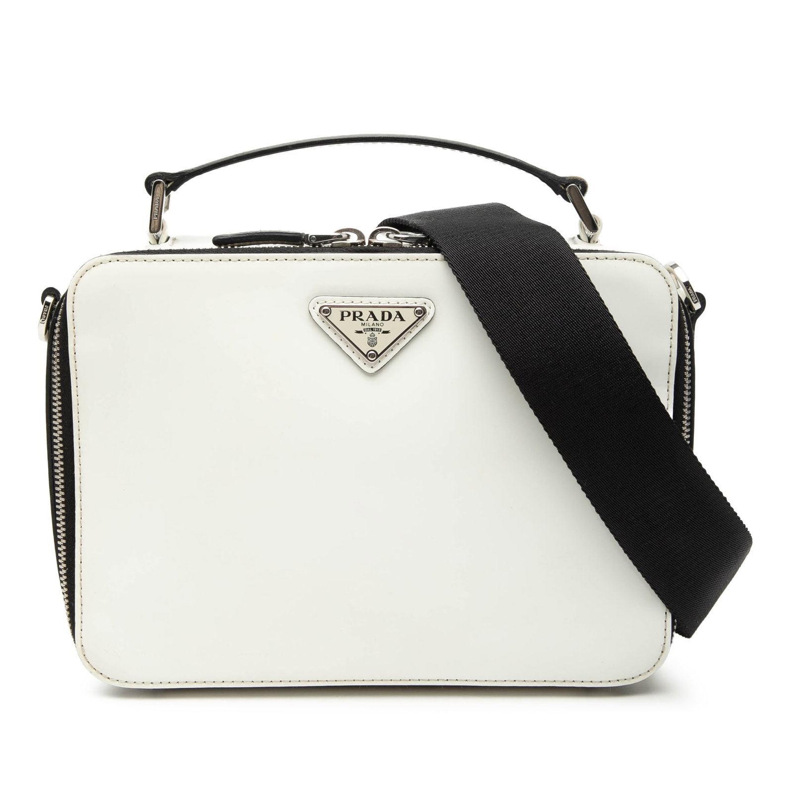 White Saffiano Leather Satchel with Detachable Strap by Prada Medium Brique: White Saffiano Leather Satchel with Detachable Strap by Prada Medium Brique This Prada Medium Saffiano Brique Satchel is crafted from saffiano leather in white and features a flat top handle, a detach