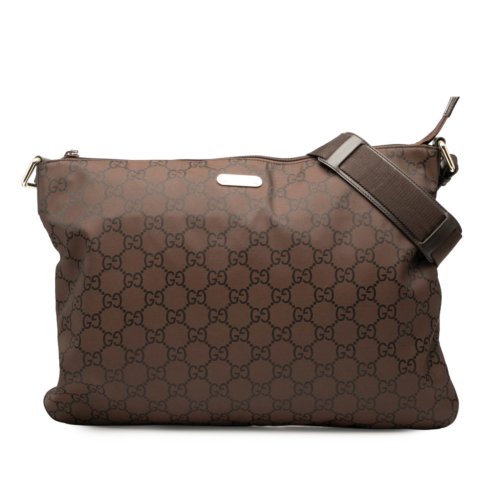 Brown Nylon GG Crossbody Bag by Gucci with Top Zip Closure: Brown Nylon GG Crossbody Bag by Gucci with Top Zip Closure This Gucci GG Nylon Crossbody bag features a brown nylon body with a flat strap, a top zip closure, and an interior zip pocket. The bag shows