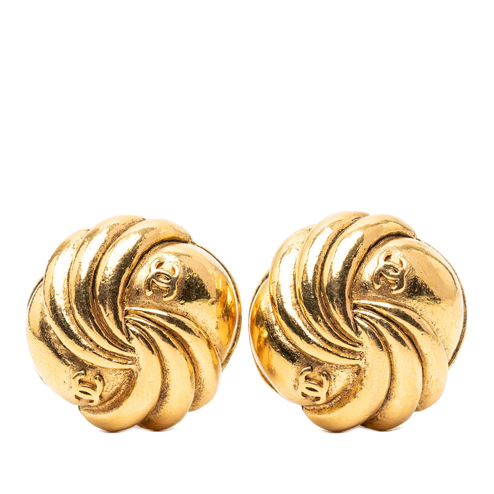 Chanel CC Swirl Clip Earrings Gold Plated Button Design: Chanel CC Swirl Clip Earrings Gold Plated Button Design These Chanel earrings feature a gold-plated metal body with a CC swirl button design and convenient clip-on closure. Made in France, they are ca