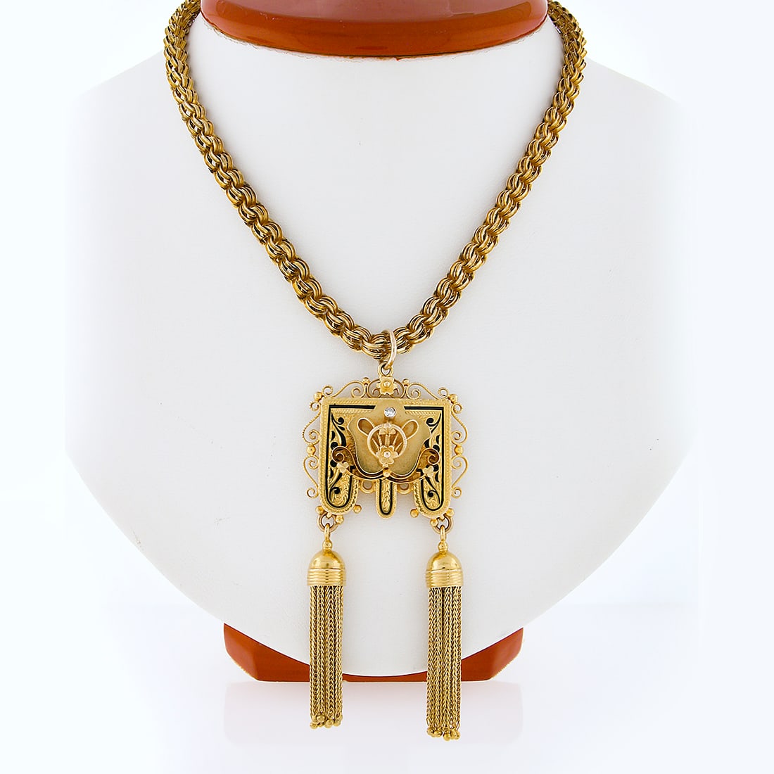 Vintage Victorian Revival 14K Gold Diamond Tassel Pendant Necklace: Vintage Victorian Revival 14K Gold Diamond Tassel Pendant Necklace This exquisite vintage necklace showcases a stunning Victorian Revival design crafted from solid 14K yellow gold. The piece features 