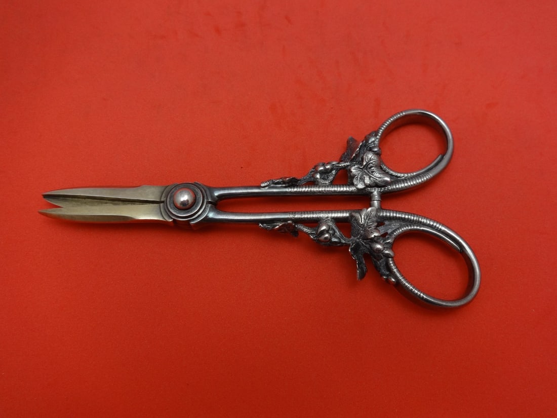 Tiffany & Co Sterling Silver Grape Shears Gold Washed 6 Inches: Tiffany & Co Sterling Silver Grape Shears Gold Washed 6 Inches This exquisite pair of grape shears by Tiffany & Co. is crafted from high-quality sterling silver and features a stunning gold wash finis