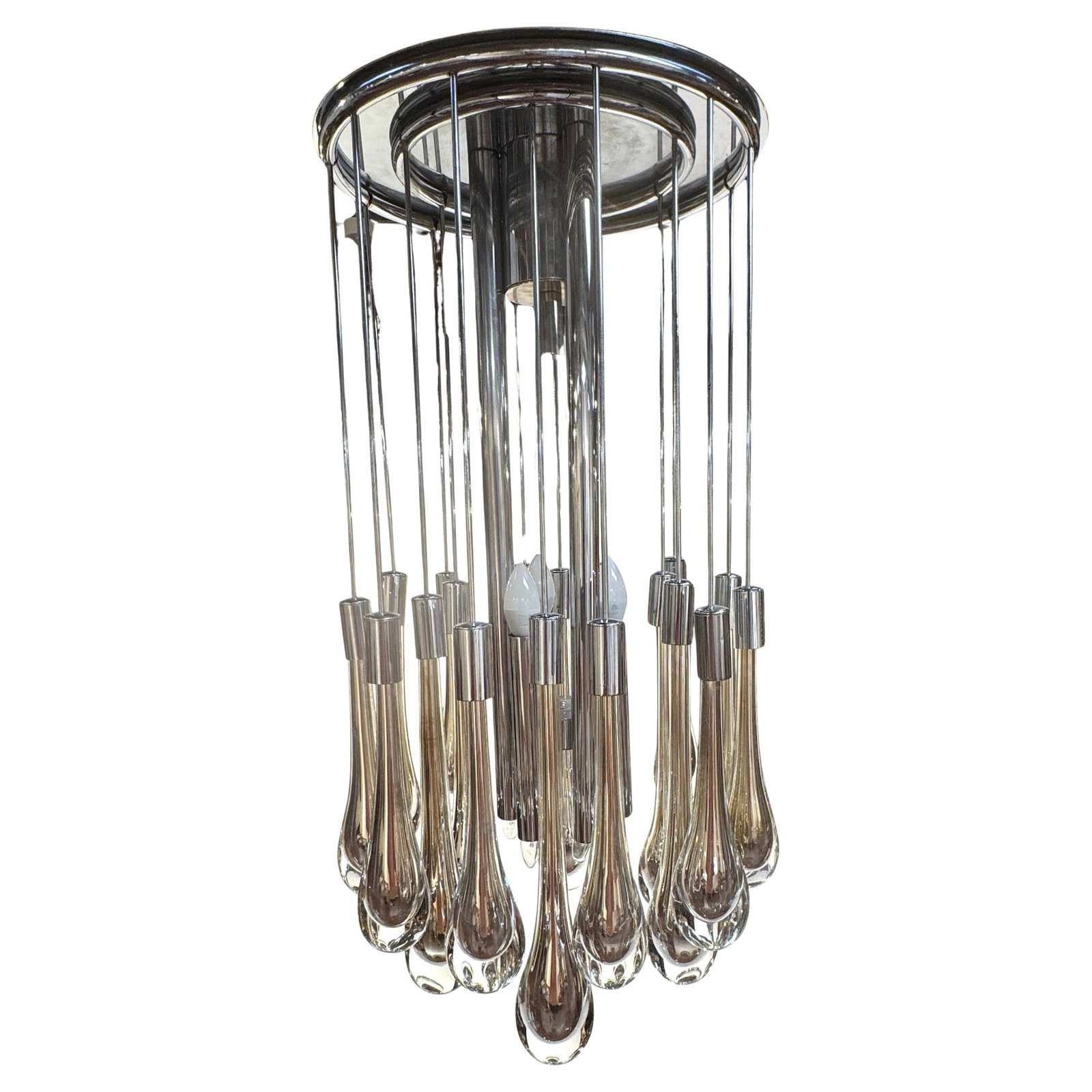 Murano Glass Chandelier With Silvered Crystal Drops Attributed to Venini 1960s: Murano Glass Chandelier With Silvered Crystal Drops Attributed to Venini 1960s This mid-century chandelier, attributed to Venini and crafted in Italy circa 1960s, features hand-blown Murano glass pend