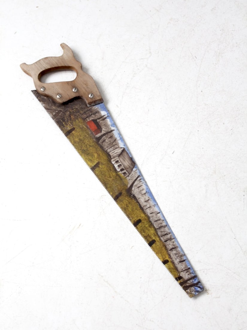 Vintage Hand-Painted Metal Saw Rustic Wall Decor 29 inch: Vintage Hand-Painted Metal Saw Rustic Wall Decor 29 inch Enhance your home or cabin decor with this unique vintage hand-painted saw that embodies rustic charm. This metal saw features a durable wooden