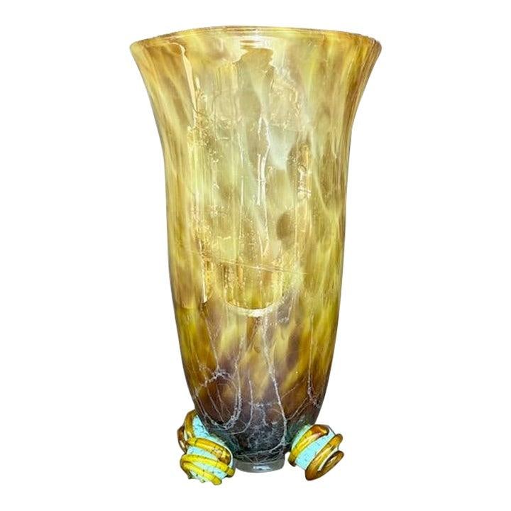 Golden Amber Hand Blown Glass Vase with Turquoise Swirl Accents: Golden Amber Hand Blown Glass Vase with Turquoise Swirl Accents This vintage boho vase highlights the artistry of hand-blown glass with a captivating blend of golden amber tones and subtle marbling th
