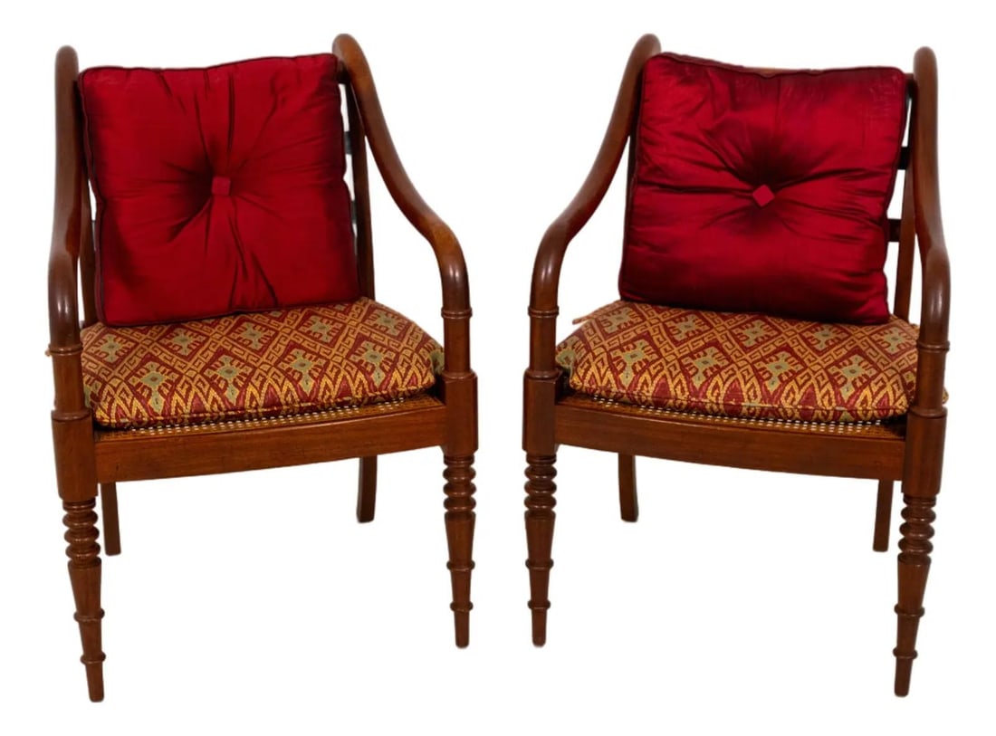 Set of Two Mahogany Armchairs with Cane Seats and Cushions Attributed to Baker: Set of Two Mahogany Armchairs with Cane Seats and Cushions Attributed to Baker This pair of armchairs is attributed to the Baker Milling Road Collection and features a factory-distressed mahogany fram