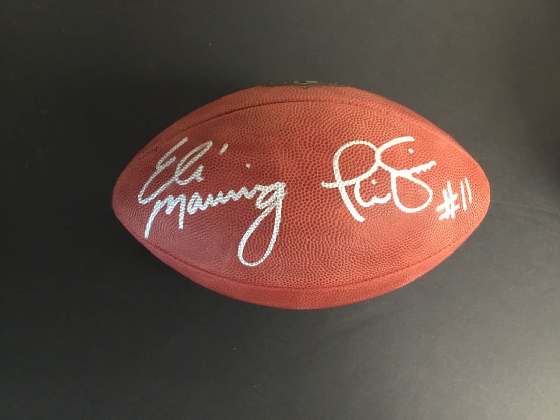 Eli Manning Phil Simms Signed Football New York Giants Fanatics Authenticated: Eli Manning Phil Simms Signed Football New York Giants Fanatics Authenticated Celebrate the legacy of the New York Giants with this autographed football featuring the signatures of two iconic quarterb