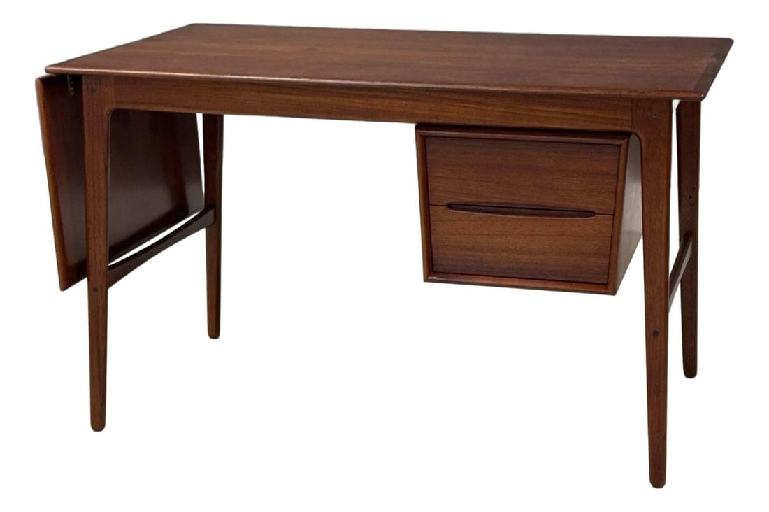 1950s Aksel Boll Jensen Teak Drop-Leaf Desk Denmark: 1950s Aksel Boll Jensen Teak Drop-Leaf Desk Denmark This elegant 1950s Danish teak desk by Aksel Boll Jensen embodies mid-century modern design with its sleek, minimalist lines and warm, rich wood gra