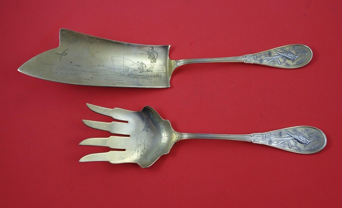 Tiffany & Co Japanese Sterling Silver Fish Serving Set Vermeil 12": Tiffany & Co Japanese Sterling Silver Fish Serving Set Vermeil 12" This exquisite fish serving set showcases the artistry of Tiffany & Co. Crafted from sterling silver and featuring a rich vermeil fin
