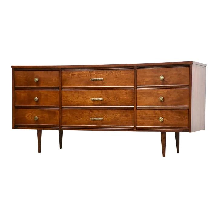 Mid Century Modern Harmony House Cherry Dresser 63.5" Brown Wood: Mid Century Modern Harmony House Cherry Dresser 63.5" Brown Wood This mid-century modern dresser by Harmony House features a stunning cherry wood finish with nine spacious drawers, providing ample sto