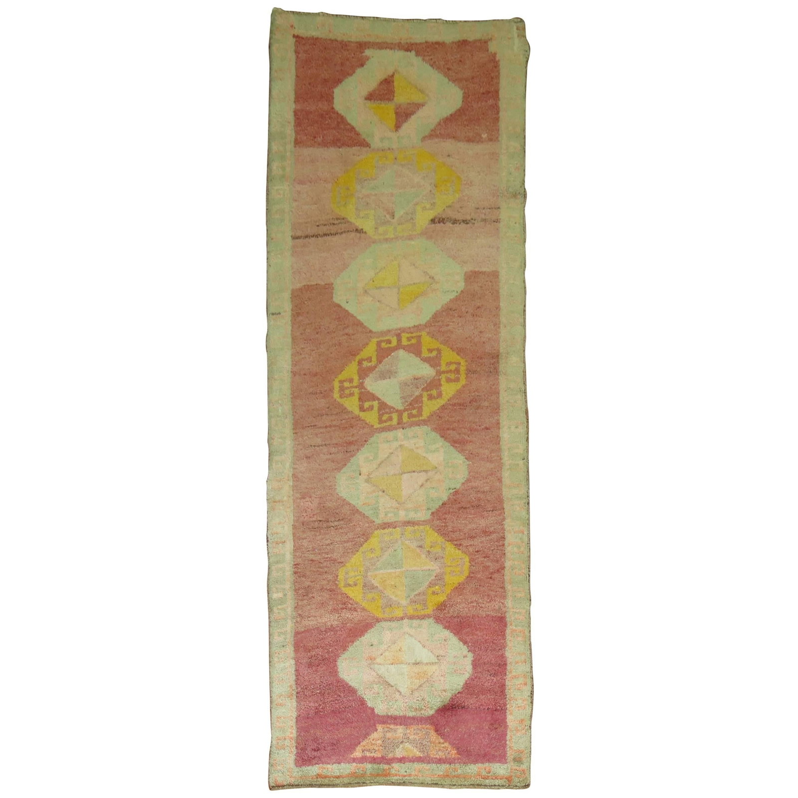 20th Century Turkish Anatolian Wool Runner Pink Magenta: 20th Century Turkish Anatolian Wool Runner Pink Magenta This hand-knotted Anatolian Turkish runner from the mid-20th century features a vibrant pink magenta color field with mint green and yellow acce