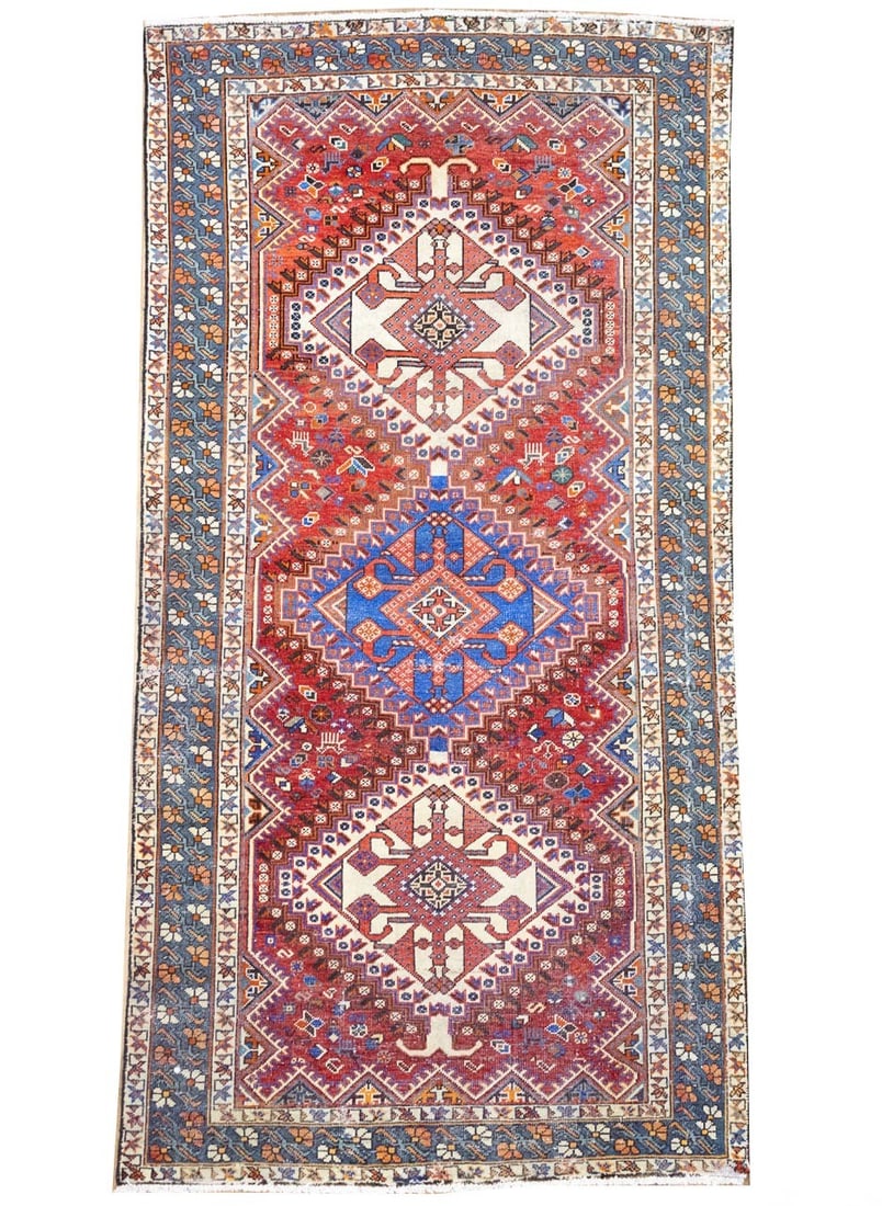 Hand Knotted Wool Tribal Geometric Area Rug 5'3 x 10'1: Hand Knotted Wool Tribal Geometric Area Rug 5'3 x 10'1 This semi-antique geometric tribal Oriental rug features a hand-knotted wool construction and a striking palette of red, blue, cream, light peach