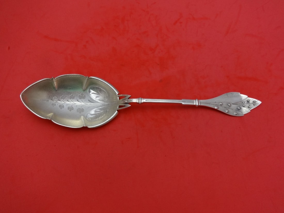 Wood & Hughes Lily of the Valley Sterling Silver Berry Spoon 9 1/4 Brite-Cut: Wood & Hughes Lily of the Valley Sterling Silver Berry Spoon 9 1/4 Brite-Cut This exquisite serving spoon features the elegant Lily of the Valley pattern by Wood & Hughes. Crafted from high-quality st