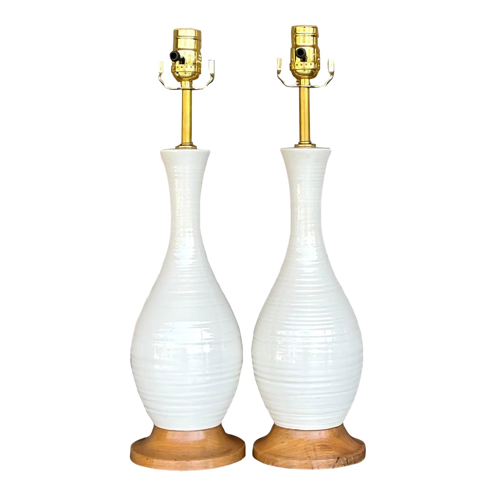 Vintage MCM Wheel Turned Ceramic Lamps Pair Off-White: Vintage MCM Wheel Turned Ceramic Lamps Pair Off-White Introducing a stunning pair of Vintage Late 20th Century Wheel Turned Ceramic Lamps, perfect for enhancing your living space with their mid-centur