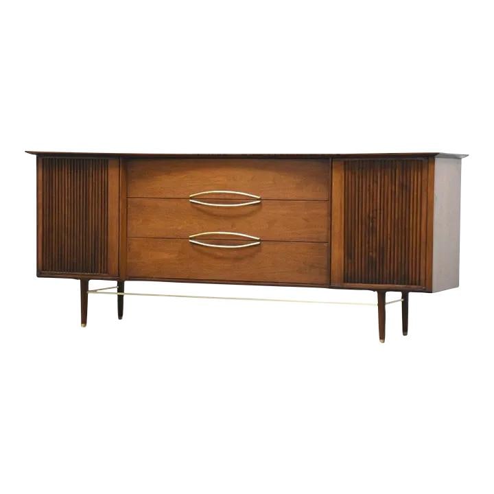 1960s Helen Hobey Walnut Dresser for Baker Furniture: 1960s Helen Hobey Walnut Dresser for Baker Furniture This stunning mid-century modern walnut dresser, designed by Helen Hobey for Baker Furniture, features a refined aesthetic with two doors and elega