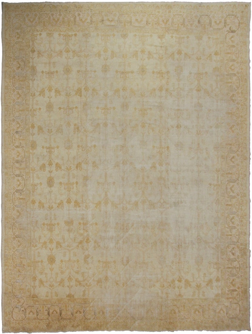 Antique Turkish Oushak Beige Wool Hand Knotted 12x15 Area Rug: Antique Turkish Oushak Beige Wool Hand Knotted 12x15 Area Rug This authentic antique Turkish Oushak rug dates to circa 1880 and features a rare, tone-on-tone beige color palette with a unique geometri
