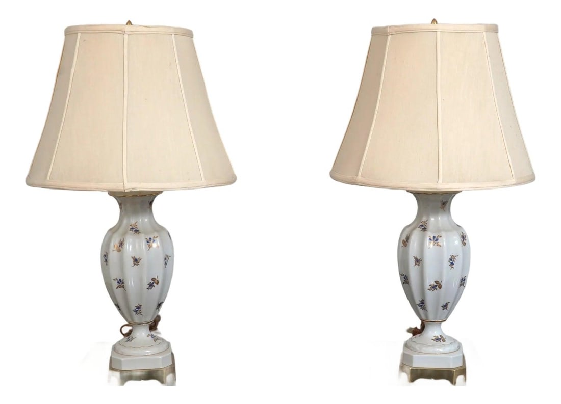 Pair of 1970s Floral Porcelain Table Lamps Paul Hanson Design: Pair of 1970s Floral Porcelain Table Lamps Paul Hanson Design This pair of table lamps, designed by Paul Hanson in the 1970s, features a blue and gold floral motif on white porcelain. The lamps have q