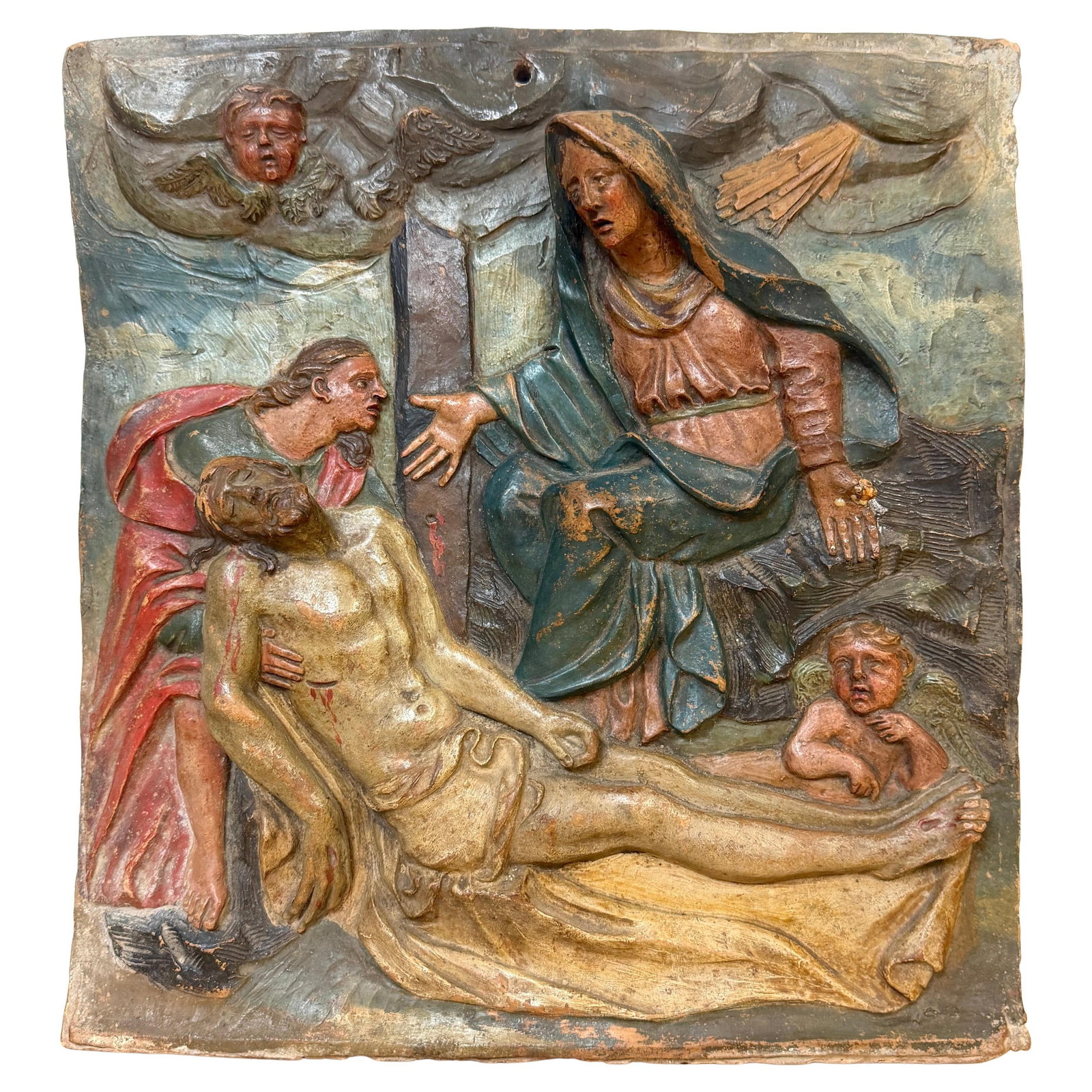 Polychrome Terracotta Baroque Pieta Relief Plaque from 19th Century Italy: Polychrome Terracotta Baroque Pieta Relief Plaque from 19th Century Italy This 19th-century Italian Baroque relief plaque is crafted from polychromed terracotta and depicts the Pieta, a central theme 