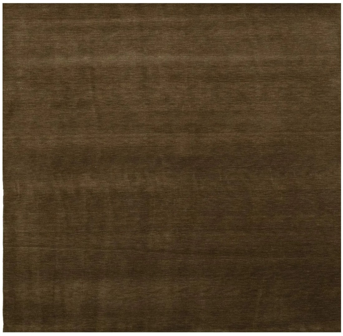 Square Gabbeh Wool Area Rug 8x8 Solid Brown Hand-Loomed: Square Gabbeh Wool Area Rug 8x8 Solid Brown Hand-Loomed This hand-loomed Gabbeh wool rug features a solid brown color, offering a versatile and elegant addition to any home decor. Its 8x8 size makes i