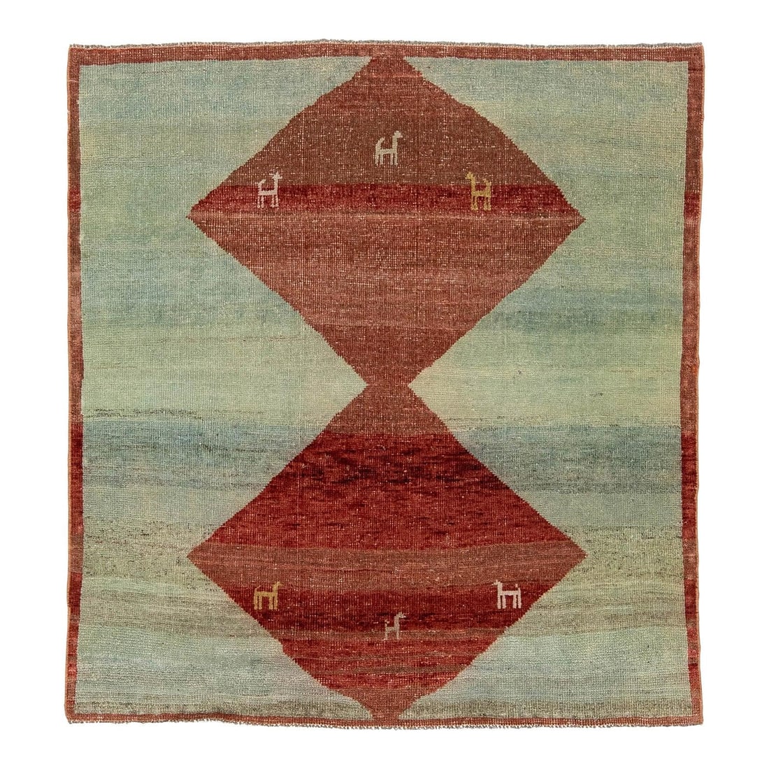 Sky Blue Gabbeh Wool Rug with Tribal Animal Diamond Motif: Sky Blue Gabbeh Wool Rug with Tribal Animal Diamond Motif This hand-knotted Gabbeh rug features a contemporary interpretation of traditional tribal designs. Crafted from high-quality wool, it offers a
