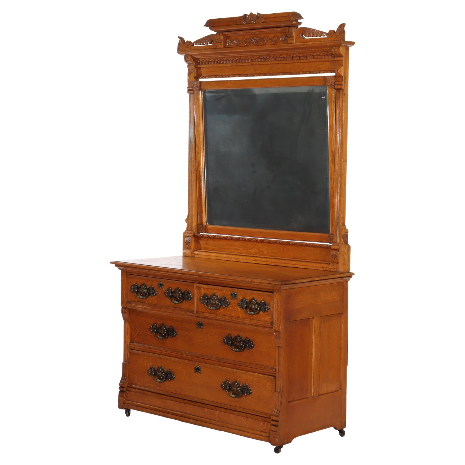 Early 20th Century Golden Oak Four-Drawer Dresser With Mirror: Early 20th Century Golden Oak Four-Drawer Dresser With Mirror This antique RJ Horner Eastlake dresser features a beautifully carved and incised design with its original golden oak finish. The piece in