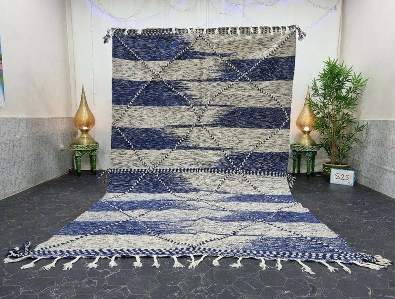Handwoven Moroccan Rug 100% Sheep Wool 10 x 5 Feet: Handwoven Moroccan Rug 100% Sheep Wool 10 x 5 Feet Enhance your space with this Fabulous Stylish Rug, handwoven in the Atlas Mountains by skilled local Berber women weavers. Crafted using traditional 