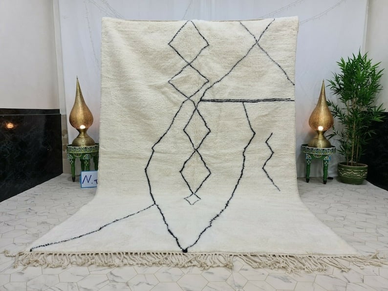 Authentic Handmade Moroccan Berber Wool Rug 8 x 5 Feet: Authentic Handmade Moroccan Berber Wool Rug 8 x 5 Feet Discover the charm of this Fabulous Soft White Handmade Moroccan Berber Wool Rug, crafted with care by local Berber women weavers in the scenic A