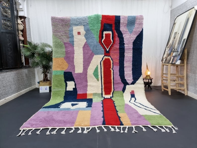 Handwoven Colorful Rug 100% Local Sheep Wool Morocco 10 x 6.56 Feet: Handwoven Colorful Rug 100% Local Sheep Wool Morocco 10 x 6.56 Feet Discover the charm of this Elegant Colorful Rug, handwoven by skilled Berber women in the Atlas Mountains of Morocco. Crafted using 