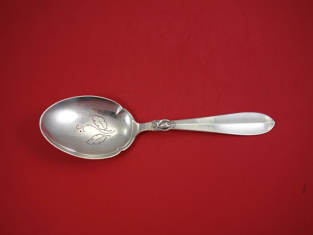 Frigast Princess Fuchsia Sterling Silver Pierced Spoon 9 7/8": Frigast Princess Fuchsia Sterling Silver Pierced Spoon 9 7/8" This exquisite pea spoon from the Princess Fuchsia pattern by Frigast showcases a beautifully pierced design featuring delicate leaves. Cr
