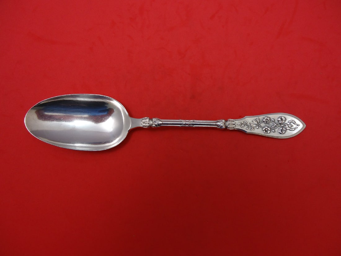 Henin & Cie Grand Cru Sterling Silver Serving Spoon 8.5": Henin & Cie Grand Cru Sterling Silver Serving Spoon 8.5" This Grand Cru serving spoon by Henin & Cie showcases exquisite craftsmanship in fine sterling silver. Measuring 8 1/2 inches, it features the 