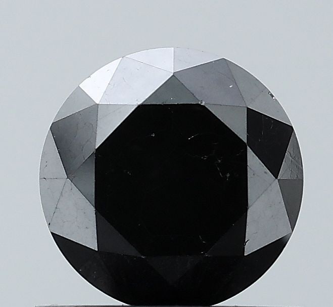 Loose Diamond - ROUND 0.9ct Black VVS2: Loose Diamond - ROUND 0.9ct Black VVS2 Source: Natural Shape: ROUND Carats: 0.9 Color: Black Certification: NONE Video: