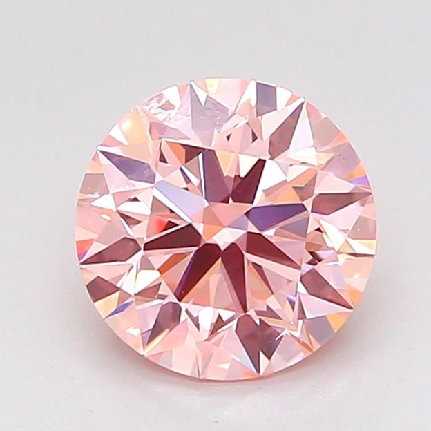 Loose Diamond - ROUND 1.5ct Fancy Vivid Pink VS2: Loose Diamond - ROUND 1.5ct Fancy Vivid Pink VS2 Source: This is a real non-mined Diamond that has been grown in a lab Shape: ROUND Carats: 1.5 Color: Fancy Vivid Pink Certification: IGI Video: Video
