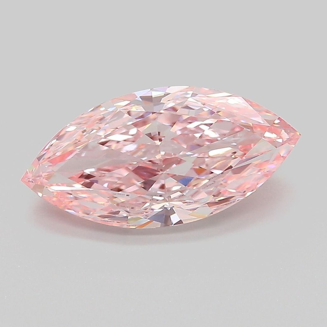 Loose Diamond - MARQUISE 3.09ct Fancy Vivid Pink VVS2: Loose Diamond - MARQUISE 3.09ct Fancy Vivid Pink VVS2 Source: This is a real non-mined Diamond that has been grown in a lab Shape: MARQUISE Carats: 3.09 Color: Fancy Vivid Pink Certification: IGI PLEA