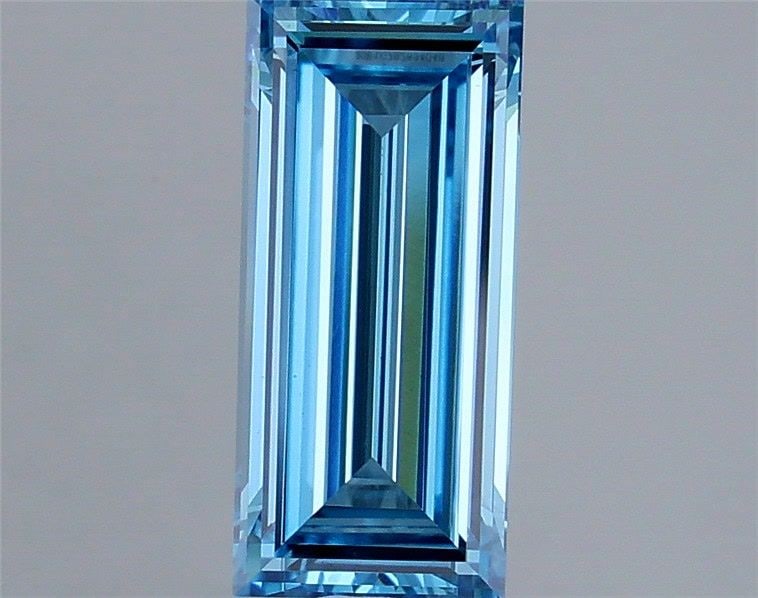 Loose Diamond - BAGUETTE 1.09ct Fancy Vivid Blue VS1: Loose Diamond - BAGUETTE 1.09ct Fancy Vivid Blue VS1 Source: This is a real non-mined Diamond that has been grown in a lab Shape: BAGUETTE Carats: 1.09 Color: Fancy Vivid Blue Certification: IGI
