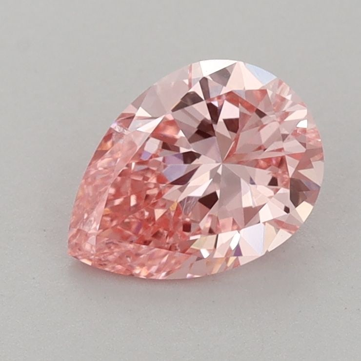 Loose Diamond - PEAR 0.99ct Fancy Vivid Pink VS2: Loose Diamond - PEAR 0.99ct Fancy Vivid Pink VS2 Source: This is a real non-mined Diamond that has been grown in a lab Shape: PEAR Carats: 0.99 Color: Fancy Vivid Pink Certification: IGI Video:
