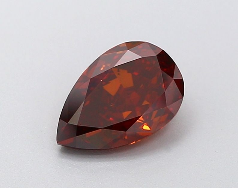Loose Diamond - PEAR 1.2ct Fancy Orange VS1: Loose Diamond - PEAR 1.2ct Fancy Orange VS1 Source: This is a real non-mined Diamond that has been grown in a lab Shape: PEAR Carats: 1.2 Color: Fancy Orange Certification: IGI Video: