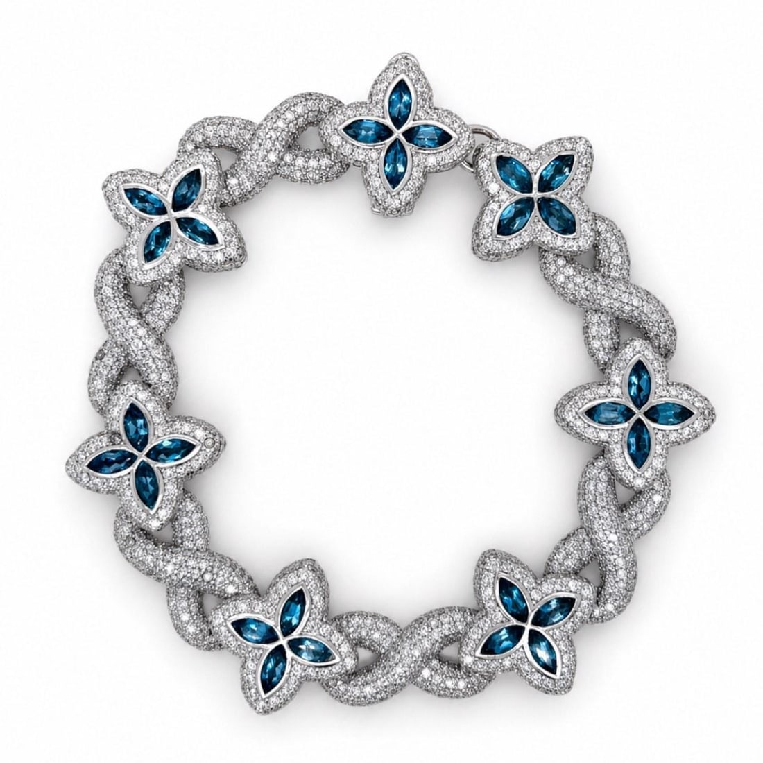 White Gold Bracelet with Blue Topaz and Diamonds 7.25 inches: White Gold Bracelet with Blue Topaz and Diamonds 7.25 inches This elegant bracelet is crafted from 14K white gold and features 28 blue topaz stones with a total weight of 5.50 carats. It is also set w