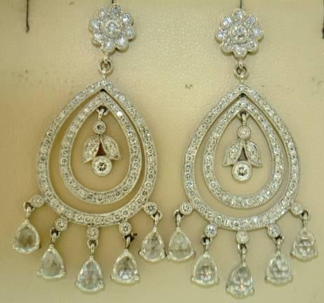 Sophia D Platinum Diamond Earrings 7.75 Ct E-F VVS-VS: Sophia D Platinum Diamond Earrings 7.75 Ct E-F VVS-VS Discover the elegance of these stunning diamond earrings featuring a total weight of approximately 7.75 carats. Crafted in platinum, these earring