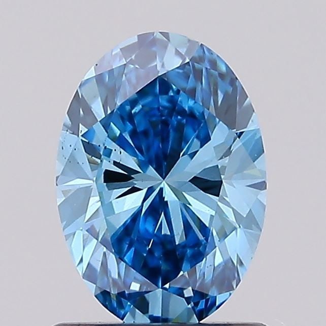 Loose Diamond - OVAL 1.05ct Fancy Vivid Blue VS2: Loose Diamond - OVAL 1.05ct Fancy Vivid Blue VS2 Source: This is a real non-mined Diamond that has been grown in a lab Shape: OVAL Carats: 1.05 Color: Fancy Vivid Blue Certification: IGI Video:
