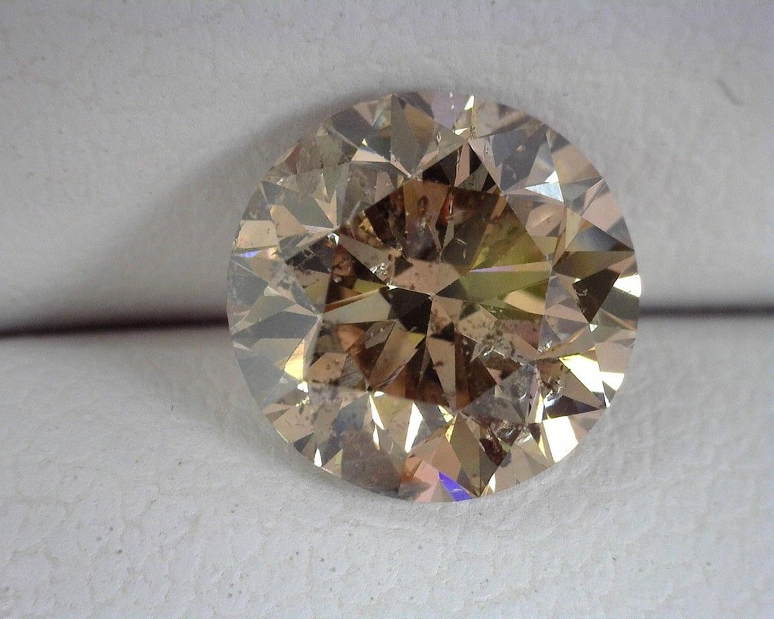 Loose Diamond - ROUND 1.63ct Champagne I1: Loose Diamond - ROUND 1.63ct Champagne I1 Source: Natural Shape: ROUND Carats: 1.63 Color: Champagne Certification: OTHER PLEASE NOTE: Framed, Large, or heavy items do not have shipping costs included