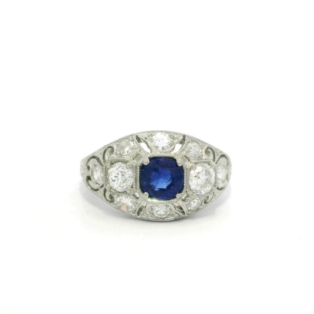 Antique Art Deco Platinum GIA Certified 0.97ct Sapphire Diamond Ring: Antique Art Deco Platinum GIA Certified 0.97ct Sapphire Diamond Ring This exquisite Antique Art Deco ring features a stunning natural sapphire from Burma, weighing 0.45 carats, with a round step cut a