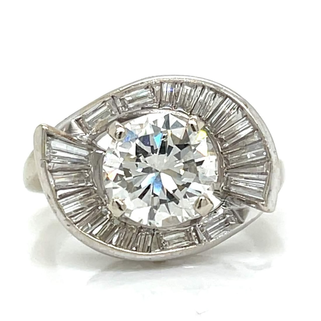 Vintage 1950's 14K White Gold 1.90 Ct Diamond Ring with 18 Accent Diamonds: Vintage 1950's 14K White Gold 1.90 Ct Diamond Ring with 18 Accent Diamonds This stunning 1950's ring features a beautiful 14K white gold band, weighing 5.2 grams. At its center is an approximately 1.9