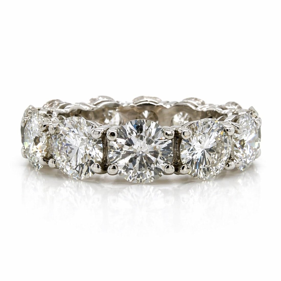 Diamond Eternity Ring in Platinum with 6.20 Carats Size 5: Diamond Eternity Ring in Platinum with 6.20 Carats Size 5 This platinum eternity band features 12 diamonds with a total weight of approximately 6.20 carats. The diamonds are graded F-I in color and VS
