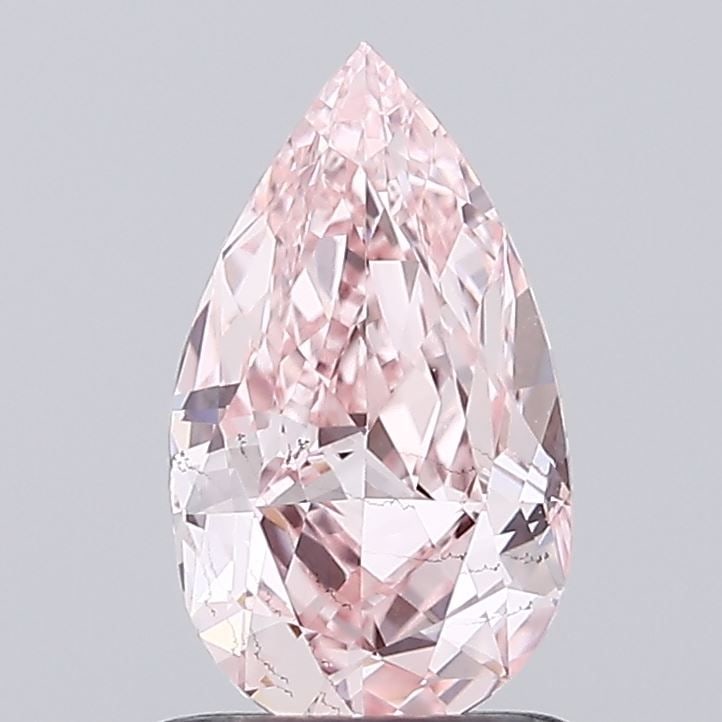 Loose Diamond - PEAR 1.03ct Fancy Vivid Pink SI1: Loose Diamond - PEAR 1.03ct Fancy Vivid Pink SI1 Source: This is a real non-mined Diamond that has been grown in a lab Shape: PEAR Carats: 1.03 Color: Fancy Vivid Pink Certification: IGI Video: