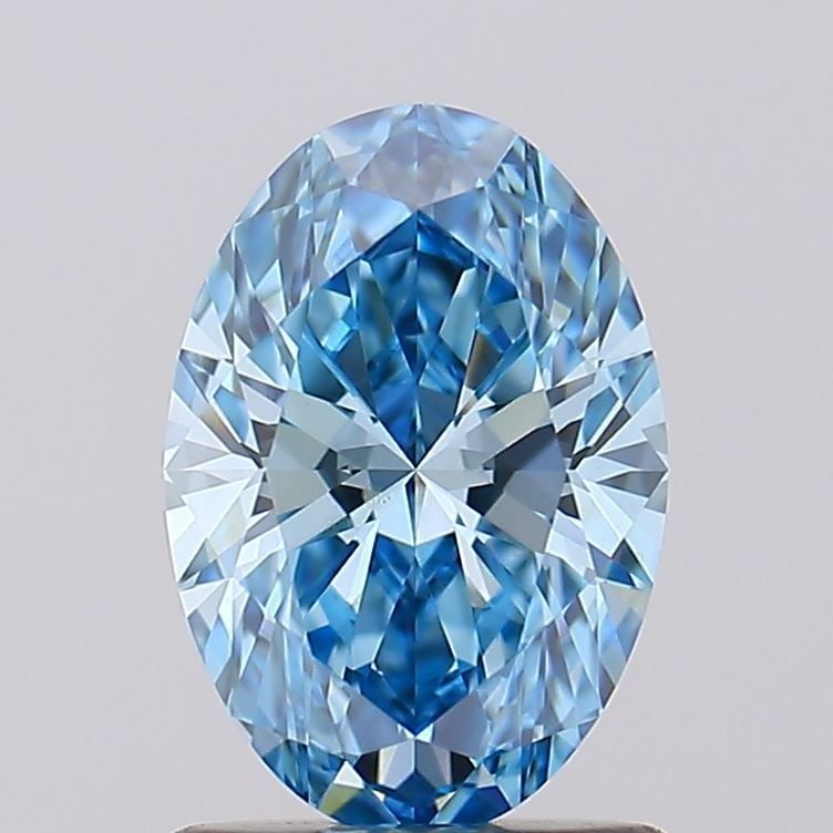 Loose Diamond - OVAL 1.08ct Fancy Vivid Blue VS1: Loose Diamond - OVAL 1.08ct Fancy Vivid Blue VS1 Source: This is a real non-mined Diamond that has been grown in a lab Shape: OVAL Carats: 1.08 Color: Fancy Vivid Blue Certification: IGI Video: