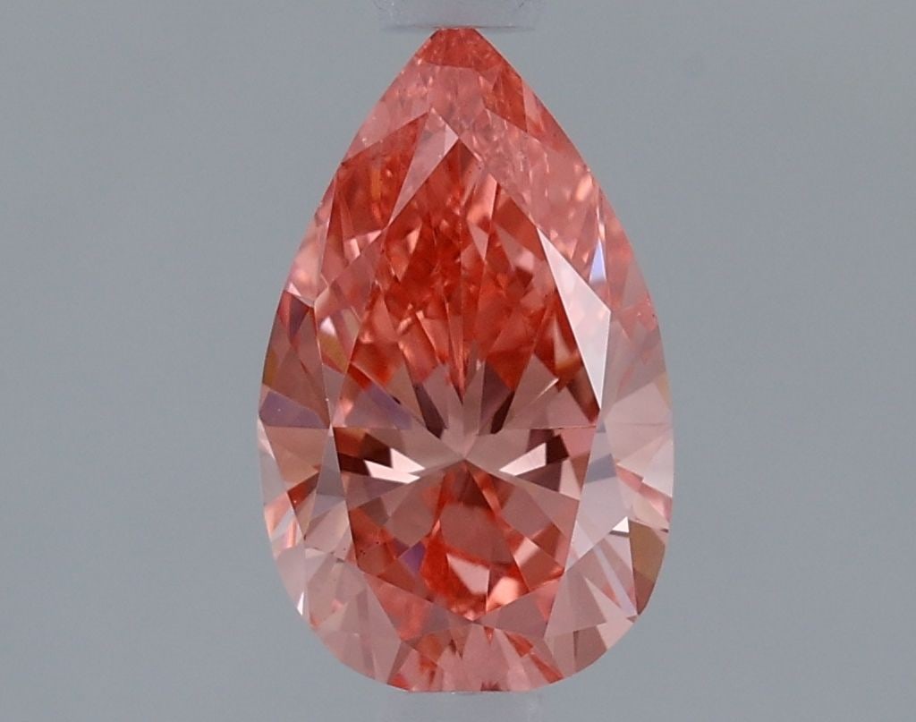 Loose Diamond - PEAR 0.96ct Fancy Vivid Pink VS2: Loose Diamond - PEAR 0.96ct Fancy Vivid Pink VS2 Source: This is a real non-mined Diamond that has been grown in a lab Shape: PEAR Carats: 0.96 Color: Fancy Vivid Pink Certification: IGI Video: