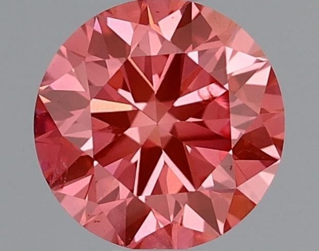 Loose Diamond - ROUND 0.56ct Fancy Vivid Pink SI1: Loose Diamond - ROUND 0.56ct Fancy Vivid Pink SI1 Source: This is a real non-mined Diamond that has been grown in a lab Shape: ROUND Carats: 0.56 Color: Fancy Vivid Pink Certification: IGI Video:
