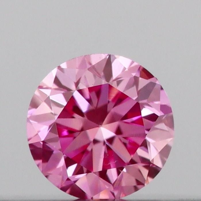 Loose Diamond - ROUND 0.11ct Fancy Vivid Pink VS1: Loose Diamond - ROUND 0.11ct Fancy Vivid Pink VS1 Source: This is a real non-mined Diamond that has been grown in a lab Shape: ROUND Carats: 0.11 Color: Fancy Vivid Pink Certification: IGI Video: