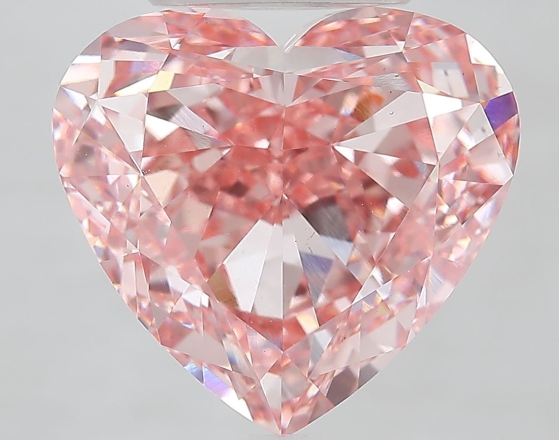 Loose Diamond - HEART 10.01ct Fancy Vivid Pink VS1: Loose Diamond - HEART 10.01ct Fancy Vivid Pink VS1 Source: This is a real non-mined Diamond that has been grown in a lab Shape: HEART Carats: 10.01 Color: Fancy Vivid Pink Certification: IGI Video: