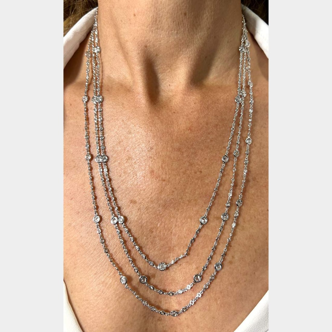 Stunning 18K White Gold 68 Inch Diamond by the Yard Necklace: Stunning 18K White Gold 68 Inch Diamond by the Yard Necklace This stunning 18K White Gold necklace features a beautiful design known as 'by the yard', showcasing a total of 251 diamonds with a combine